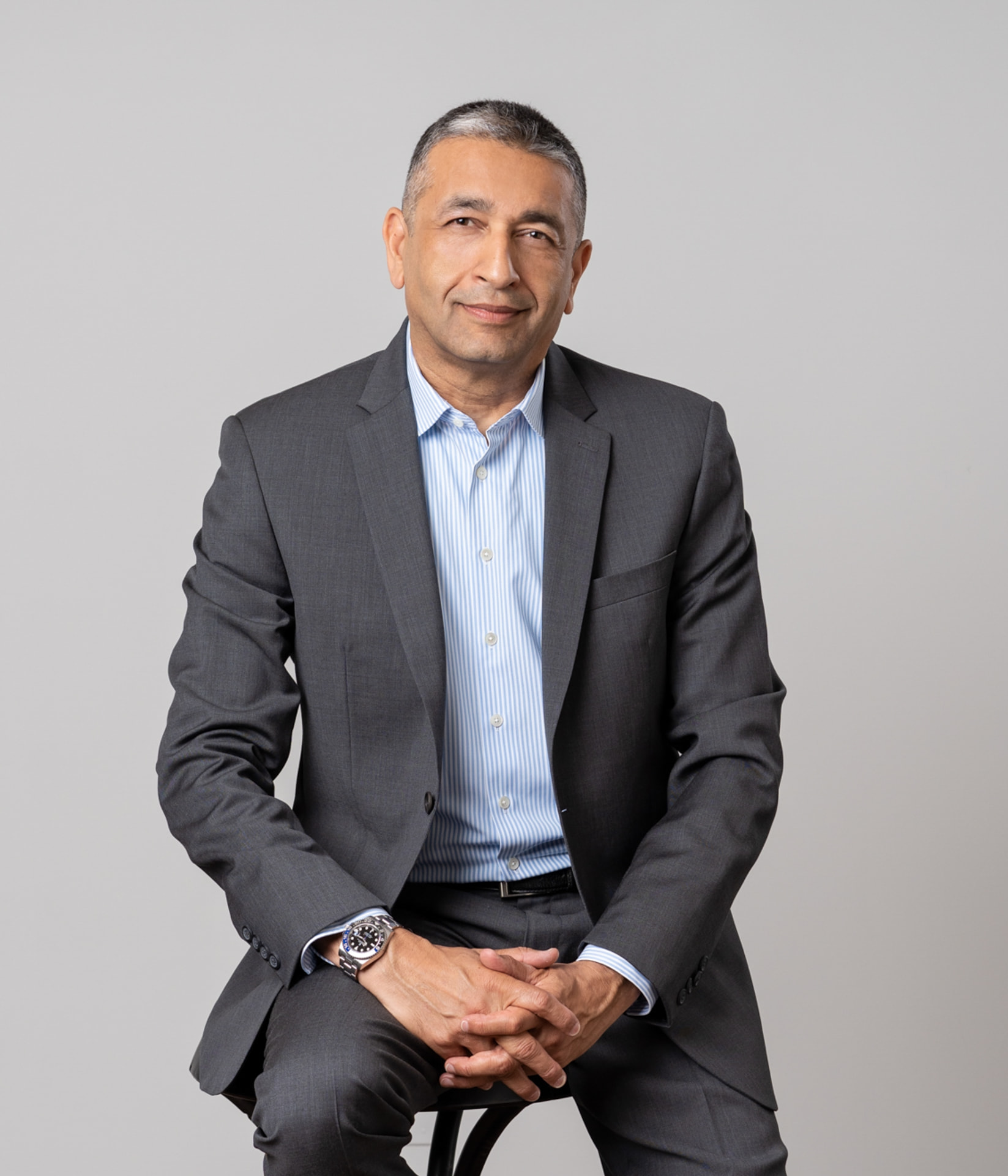 Pranav Sahai seated at his desk